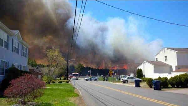 A wildfire rages in Beachwood On April 24, 2014. Photo by @kaylaxjean5 via Twitter. Wildfire photo