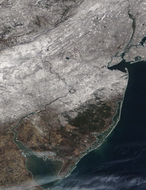 Figure 4. NASA MODIS visible satellite image showing snow cover across northern, central and parts of southwest NJ and surrounding areas to the east, north, and west on the morning of February 15th. The only cloud cover is seen along the central Delaware Bay coast and in the region close to Cape May (Cape May). NASA MODIS visible satellite image showing snow cover across northern, central and parts of southwest NJ and surrounding areas to the east, north, and west on the morning of February 15th. The only cloud cover is seen along the central Delaware Bay coast and in the region close to Cape May.