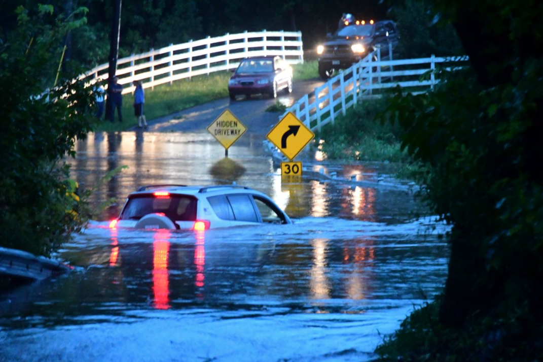Figure 7. Flash flooding on New Hampton Road in Raritan Township on July 17 (courtesy of R. Maxwell, NJ Advance Media). Flash flooding in Raritan Township on July 17