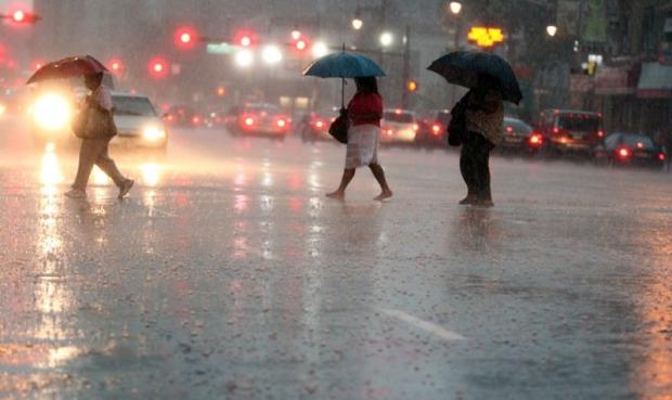 Photo by Saed Hindash/The Star-Ledger Rainy street