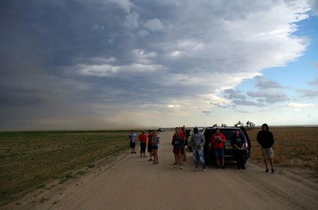Rutgers students observing a thunderstorm near Lamar, Colorado. (Photo credit: Michael Lee) Storm Chasing Photo